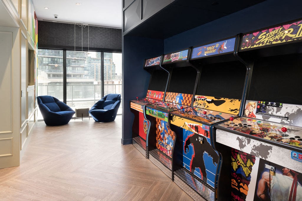 the games room is filled with rows of pinball machines