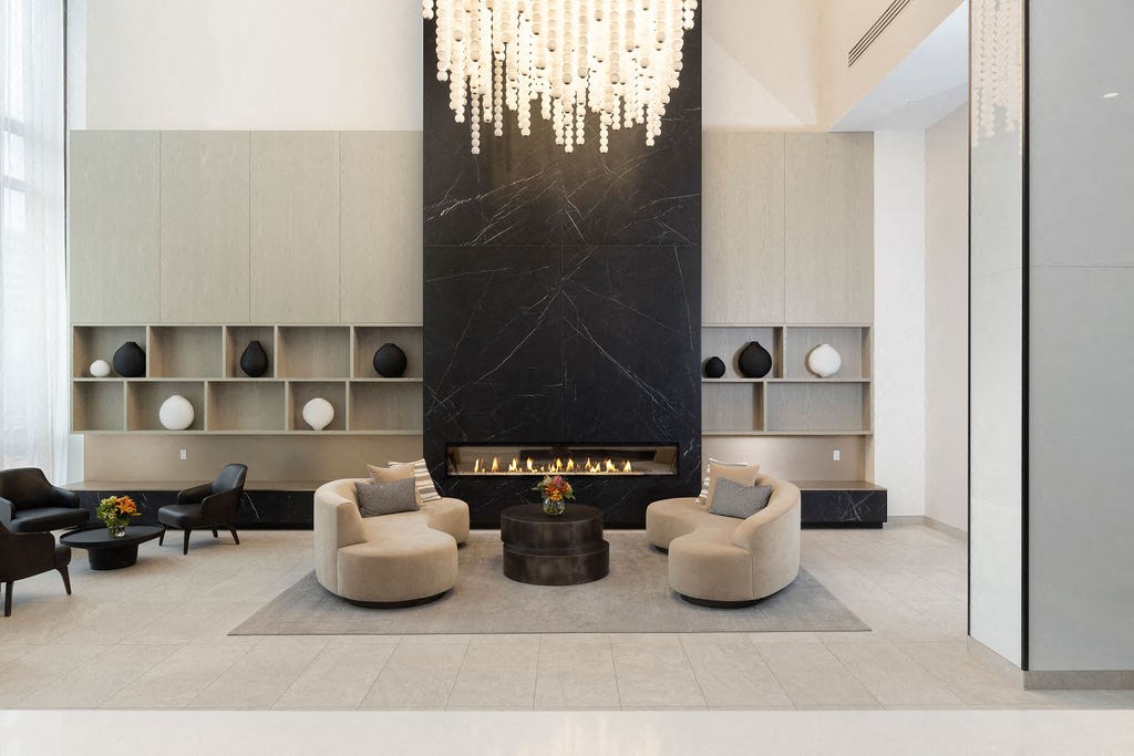 A modern living room with a fireplace and a chandelier.