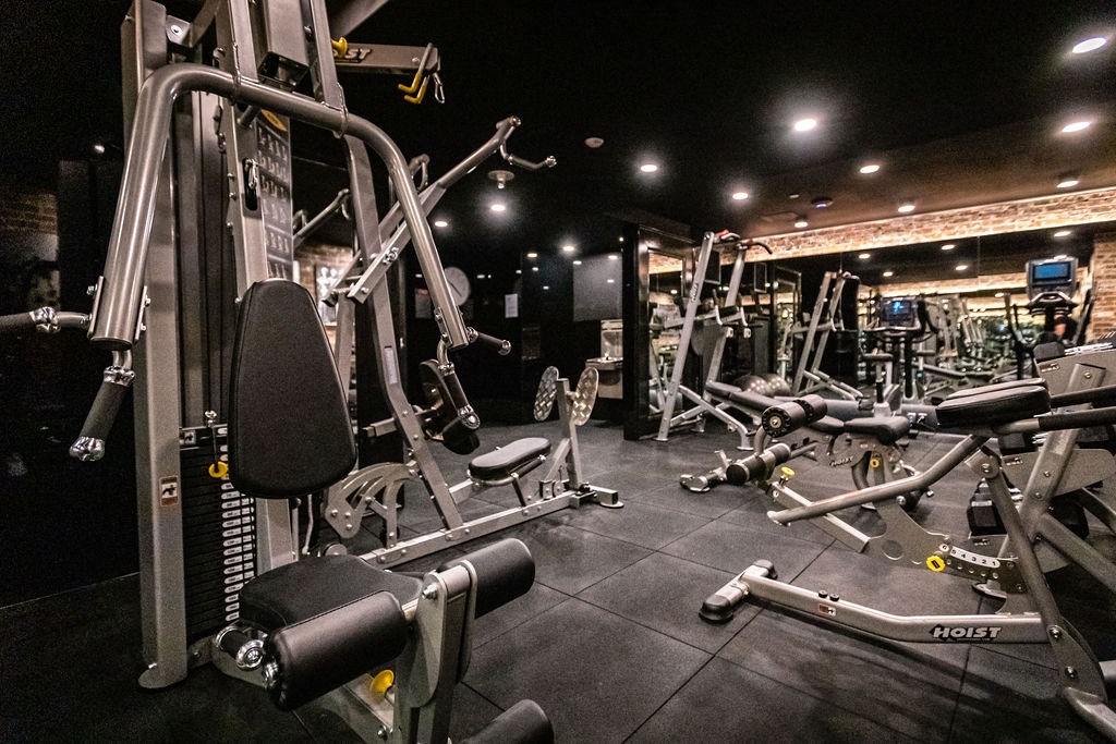 a gym with weights and other exercise equipments in it