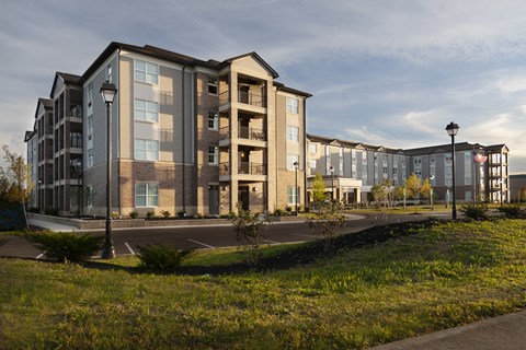 a large apartment building on a city street