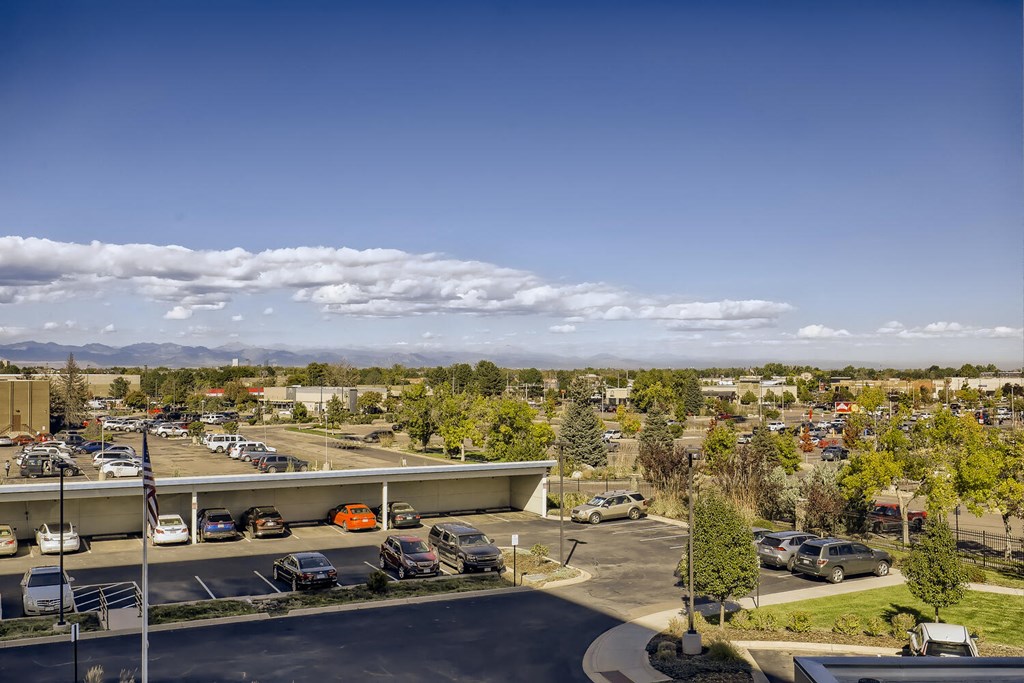 a view of the parking lot from the roof of a building