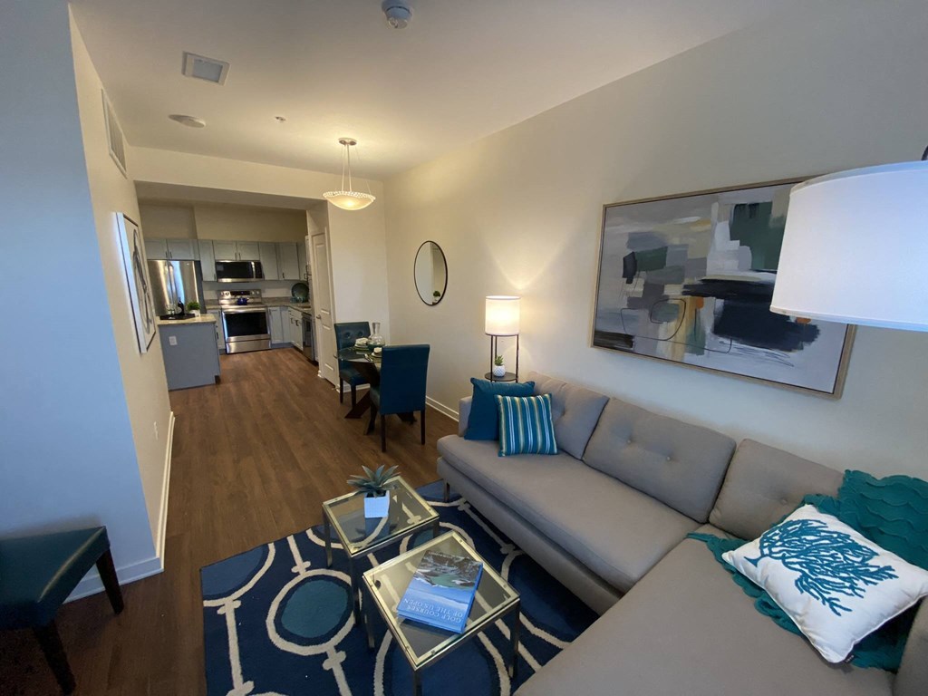 a living room with a couch and a table