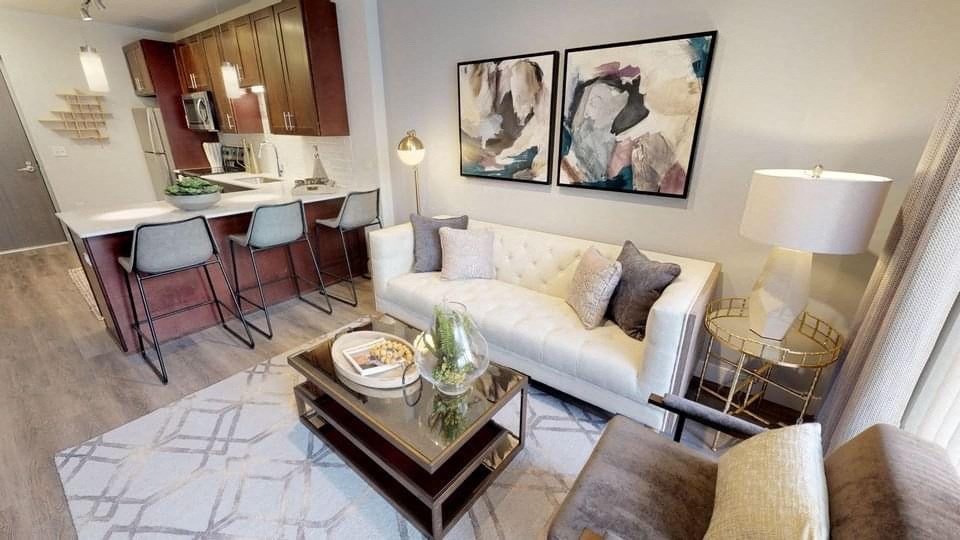 a living room with a couch and a table