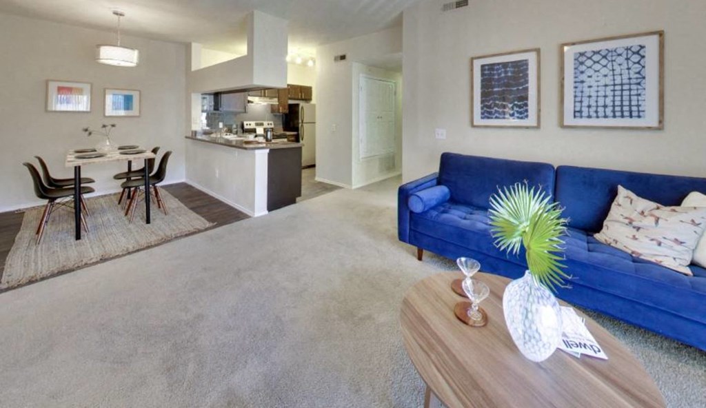 a living room with a couch and a table