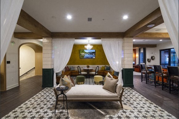 a living room with a couch and a table