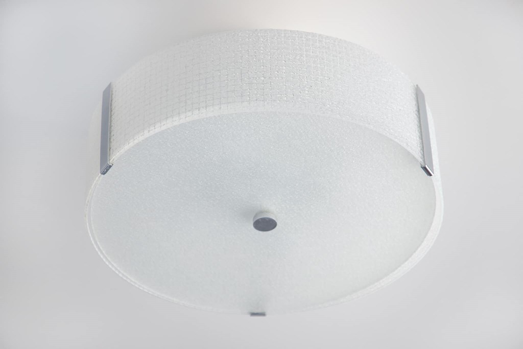a white ceiling lamp with a white background