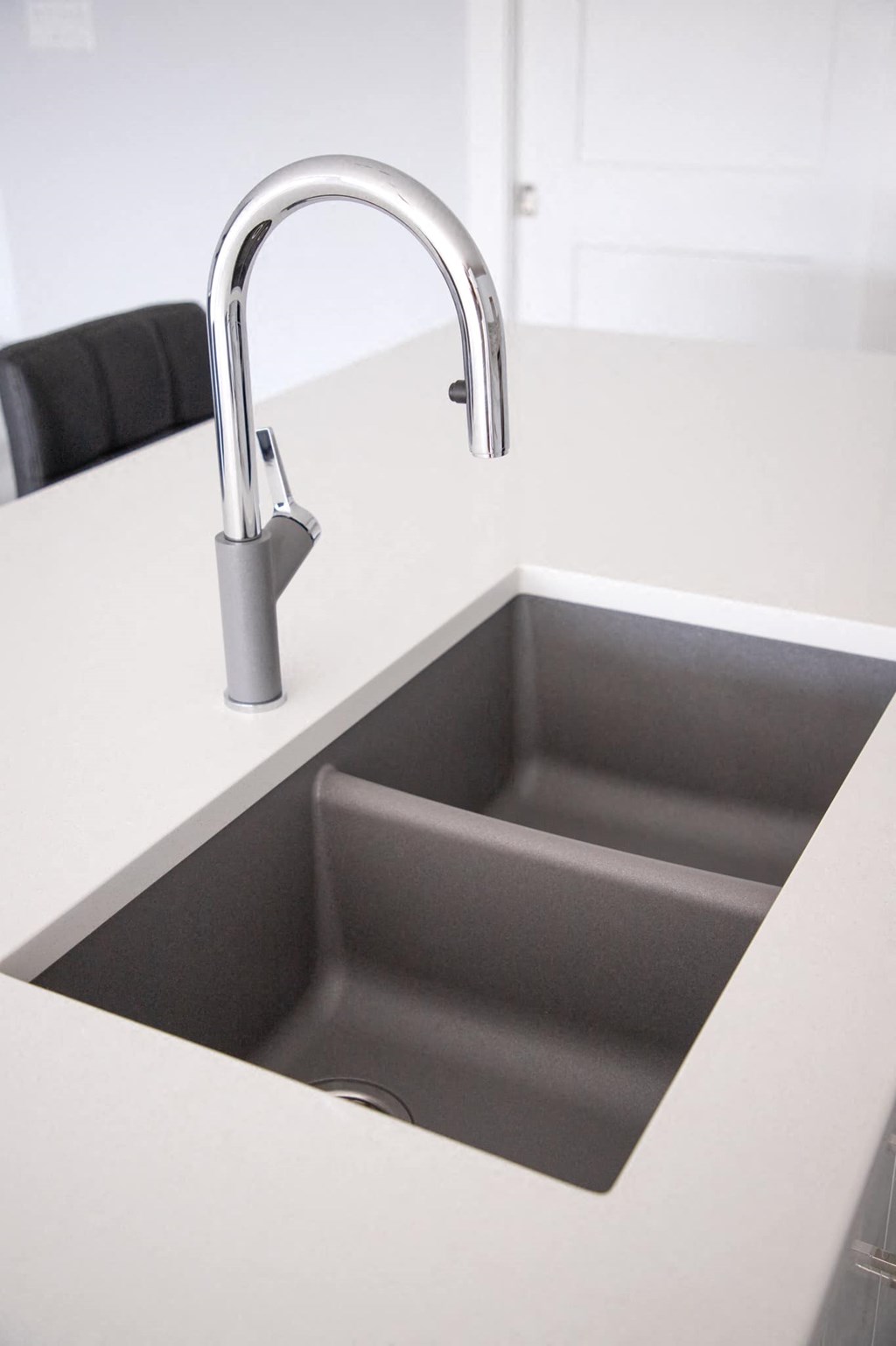 a close up of a kitchen sink and a faucet