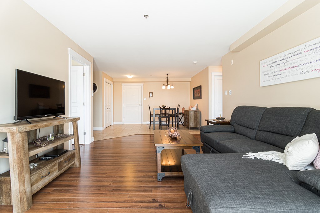 a living room with a couch and a television