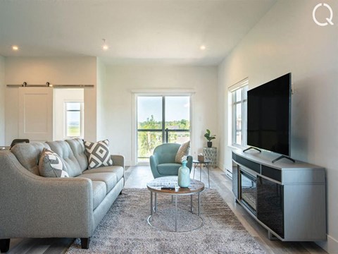 a living room with a couch and a television
