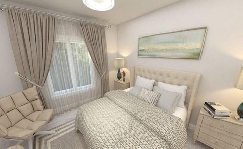 a white bedroom with a bed and a window