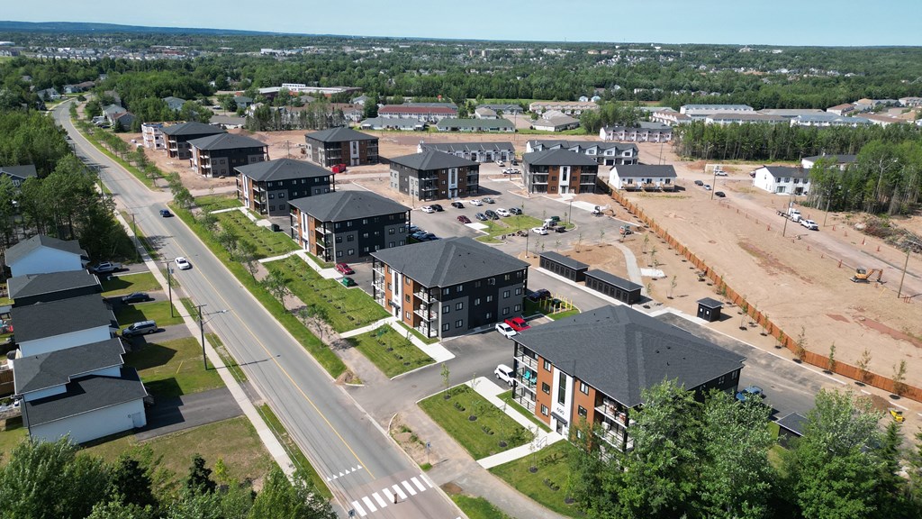 an aerial view of a housing development in a city
