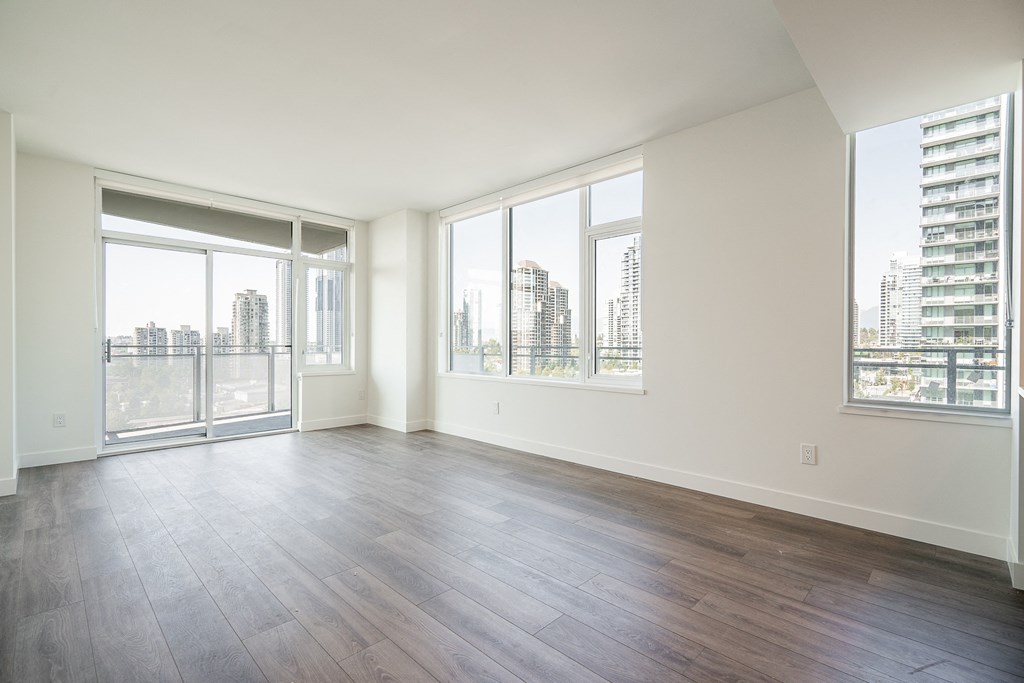 Living and dining areas of a three bedroom unit. Unit may be "similar" to the picture shown, but may not be exactly the same.