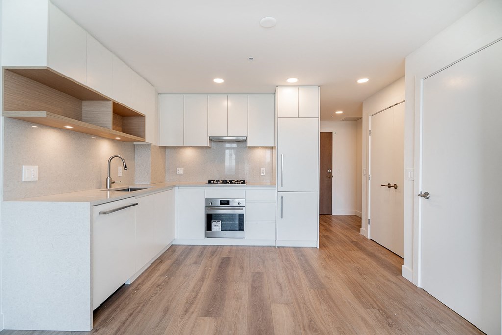 Kitchen of a one bedroom unit. Unit may be "similar" to the picture shown, but may not be exactly the same.