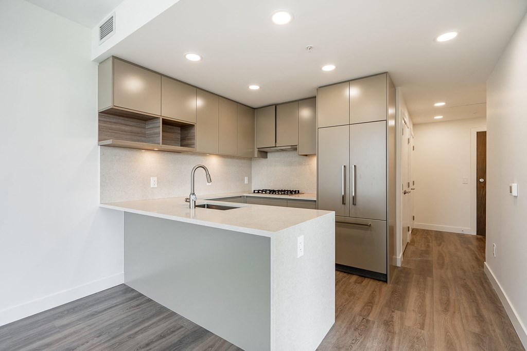 Kitchen of a two bedroom unit. Unit may be "similar" to the picture shown, but may not be exactly the same.