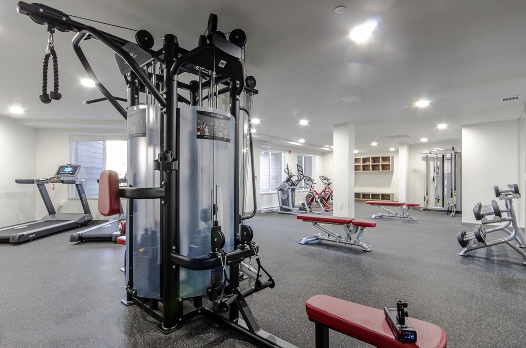 the gym at the district flats apartments in lenexa