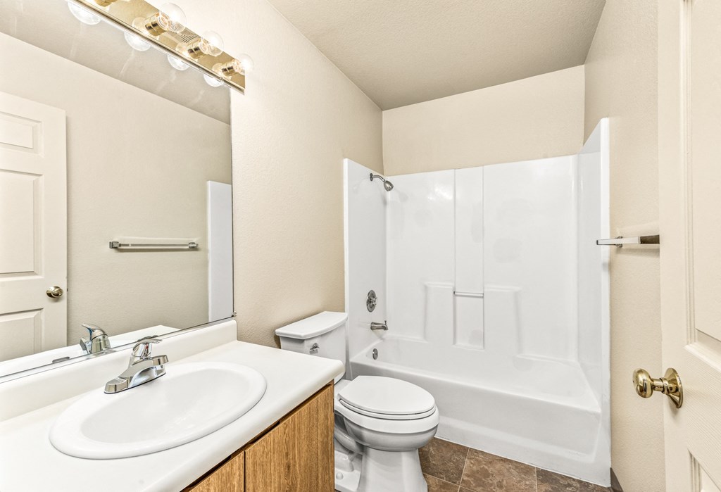 Bathroom with a sink toilet and a shower at Meadowview Apartments, Santa Rosa, CA