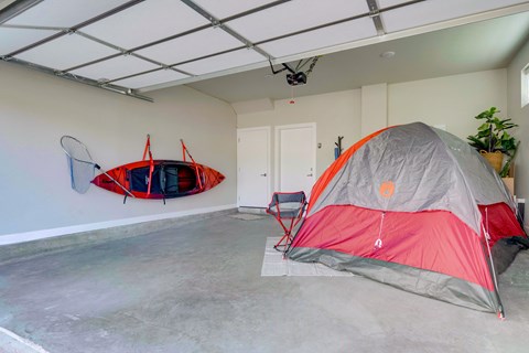 Townhome two-car garage with door entry into townhome.