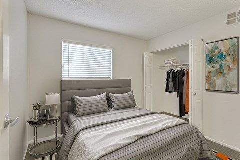 our apartments offer a bedroom with a bed and closet