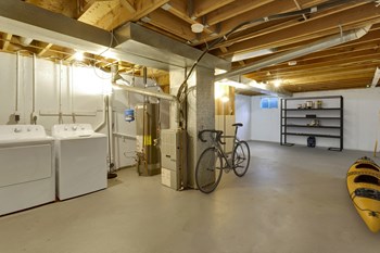 Spacious basements that include a full sized washer and dryer - Photo Gallery 21