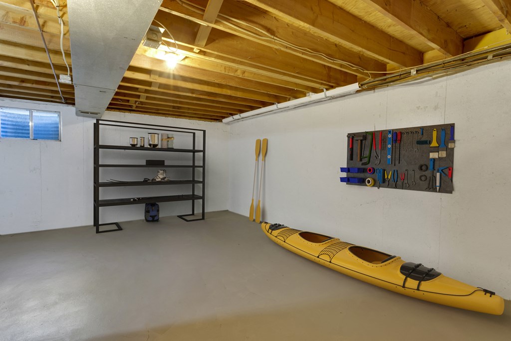 Spacious basements that include a full sized washer and dryer