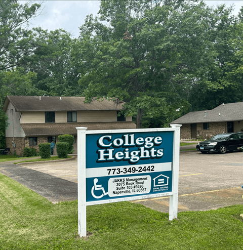A sign for College Heights with a phone number and address.