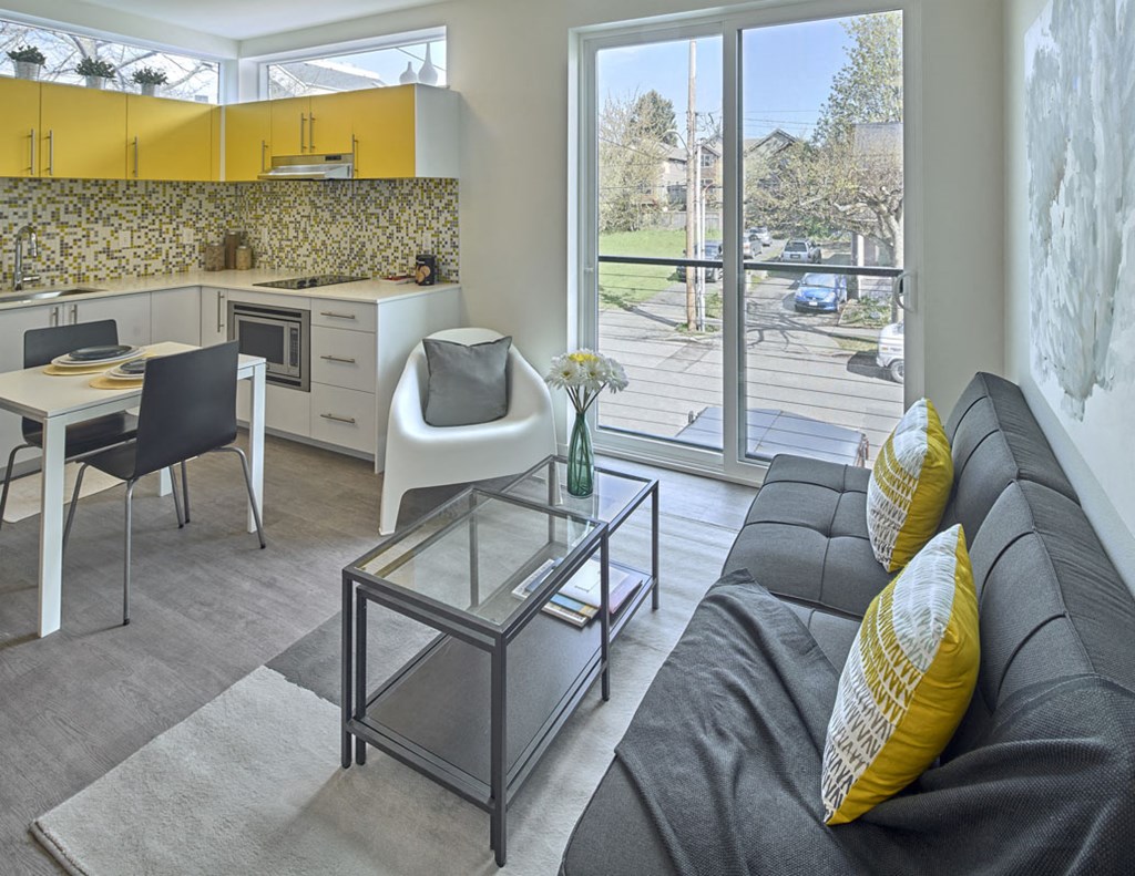 a living room with a couch and a table