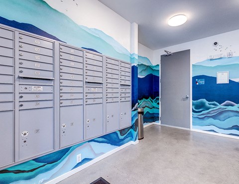 the locker room at the spa has a wall of lockers