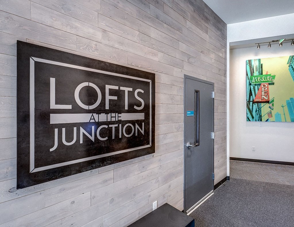 a lobby with a sign on the wall that saysols and the junction