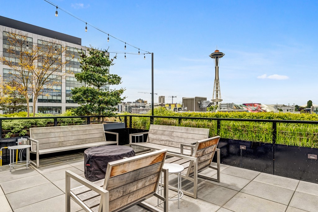 views of the eiffel tower and the city from the patio of a building
