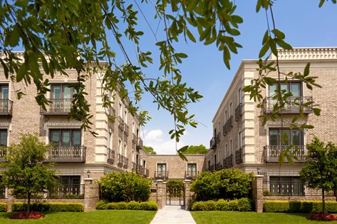 A building with a gate in front of it.