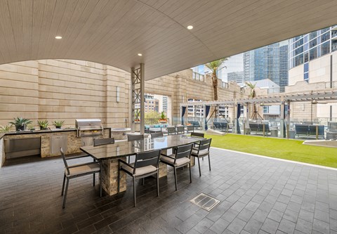 A patio with a table and chairs is shown.