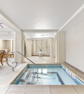 a swimming pool in a lobby of a hotel at HIGHGROVE, Stamford