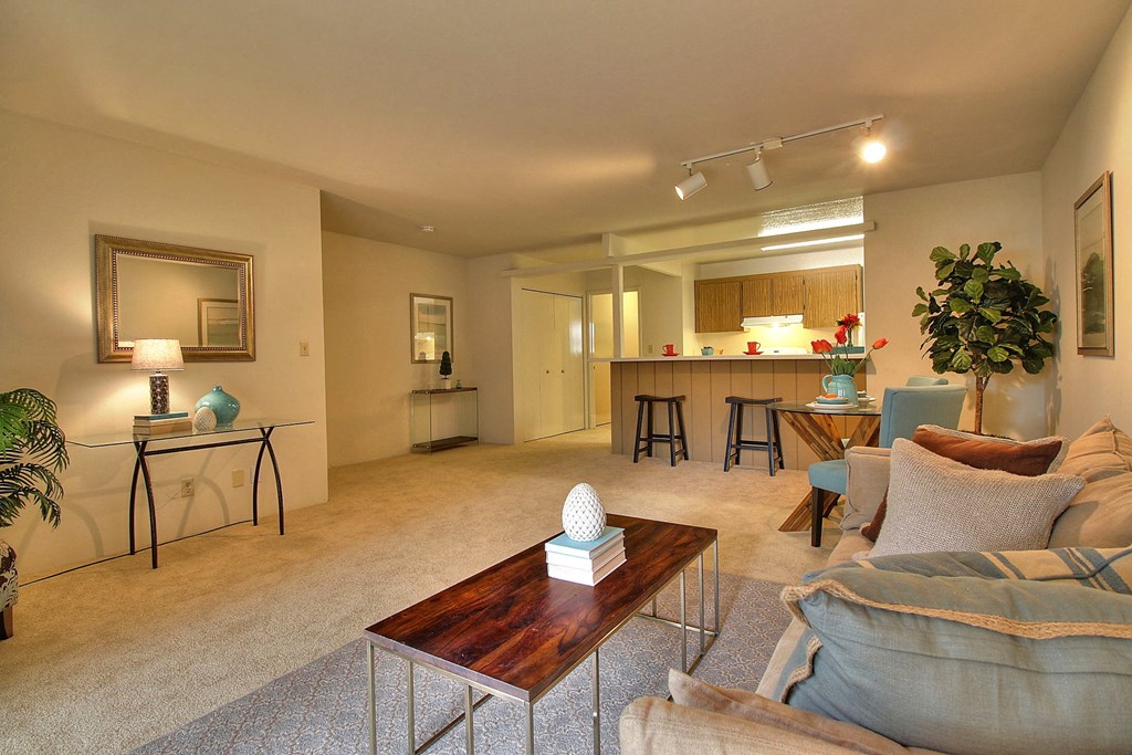 a living room with a couch and a table