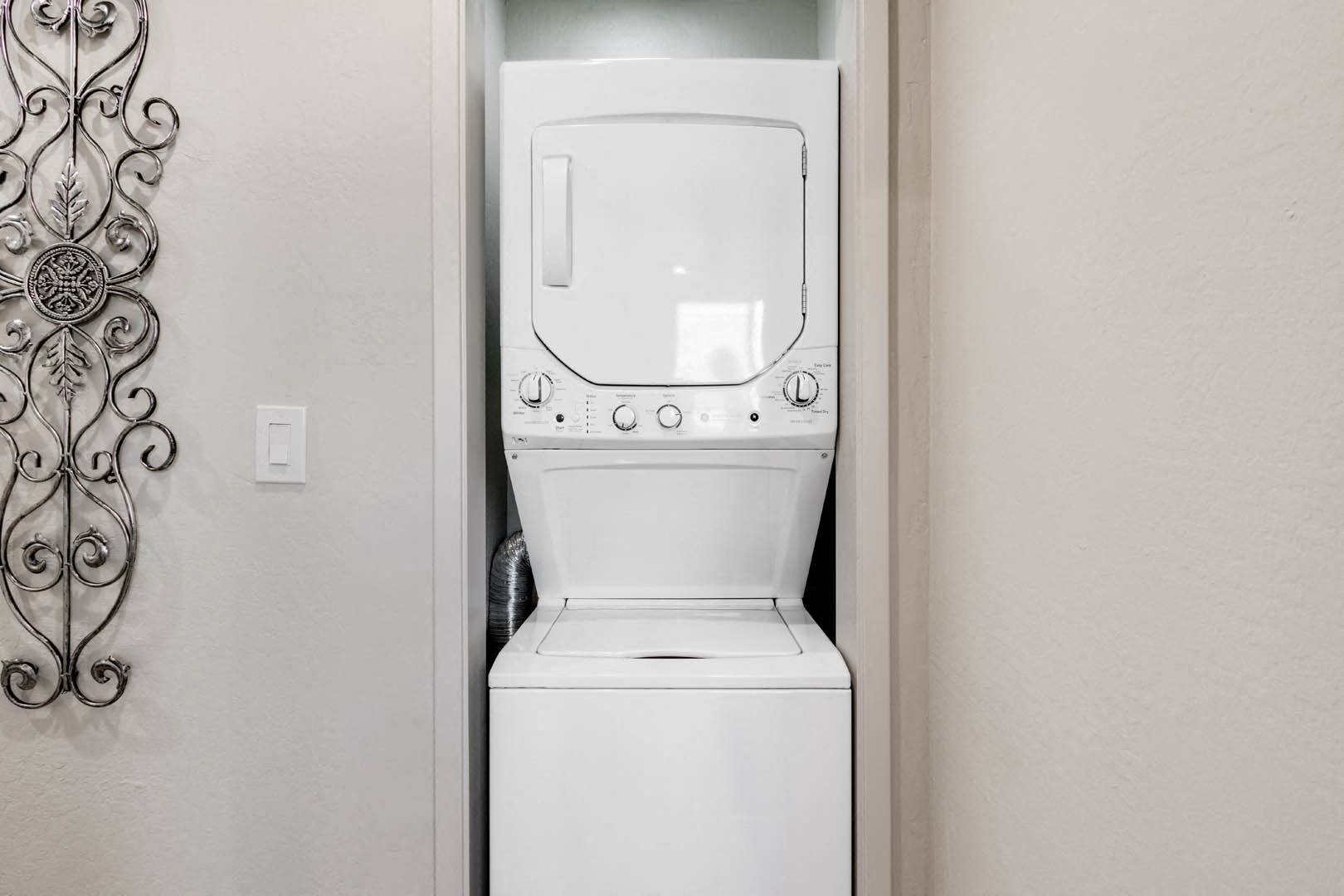 a washer and dryer in a bathroom