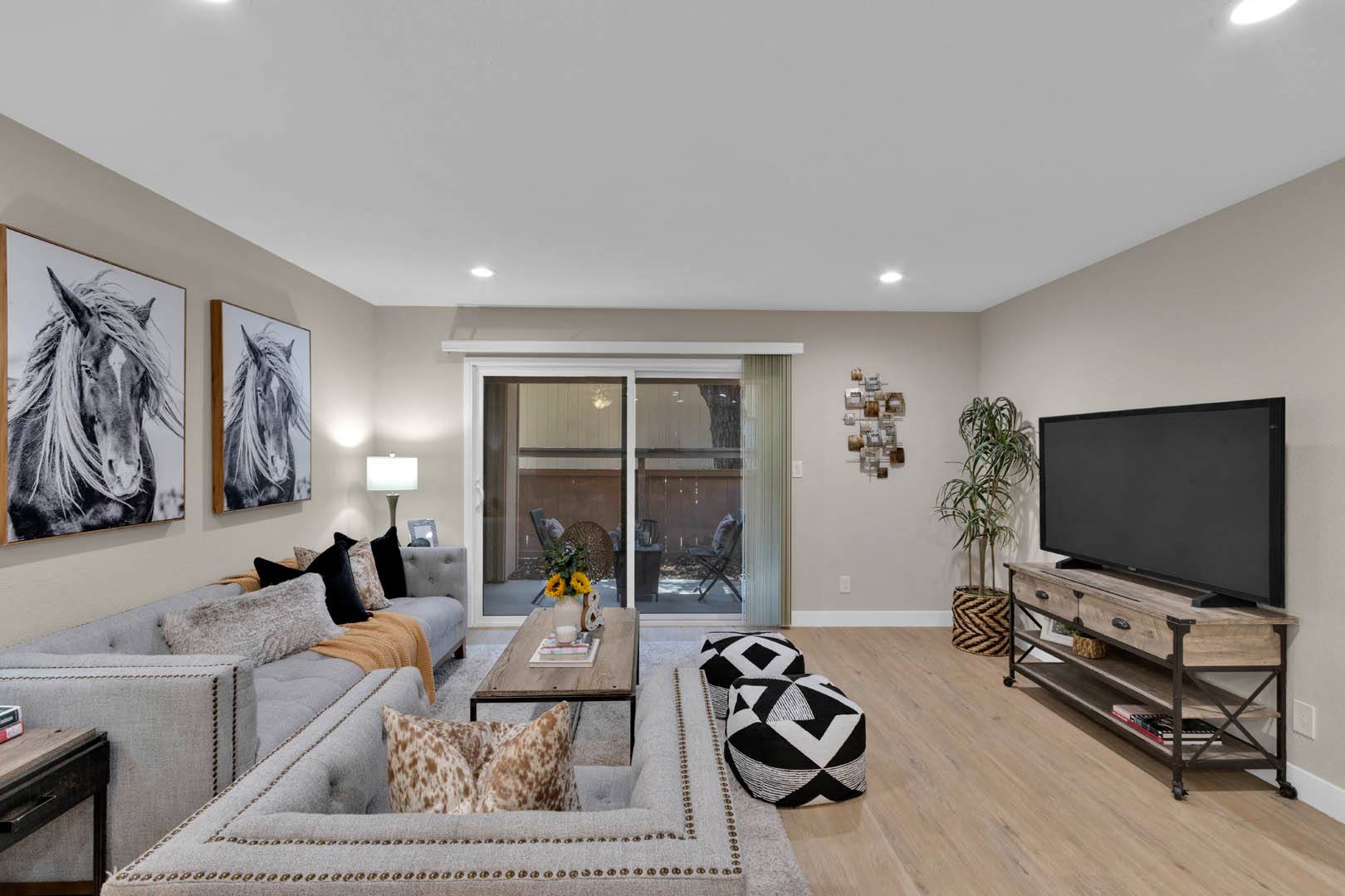 a living room with a couch and a television