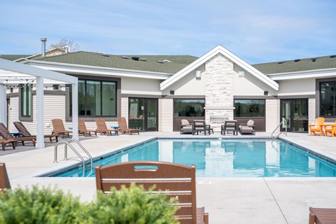 A house with a pool in the backyard.