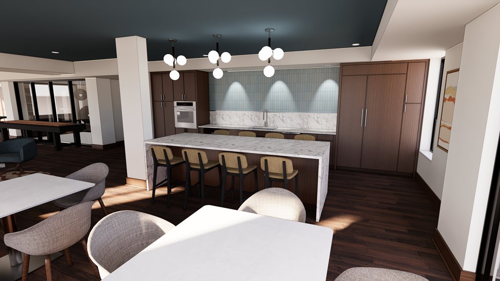 A modern kitchen with a dining table and chairs.