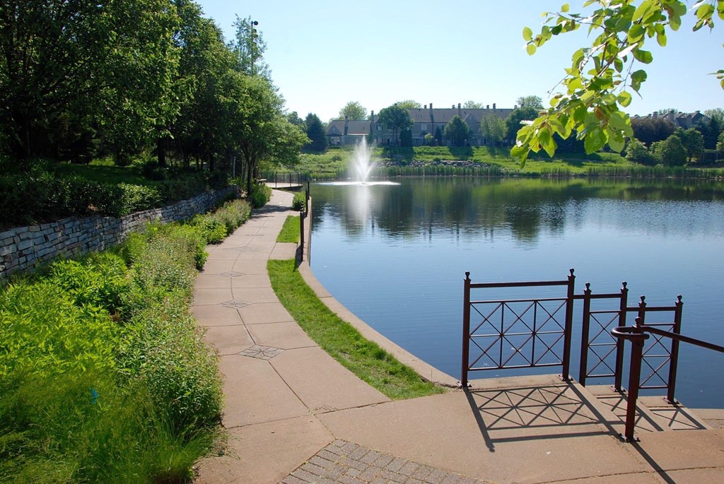 Walking Trail next to Pond with Fountain