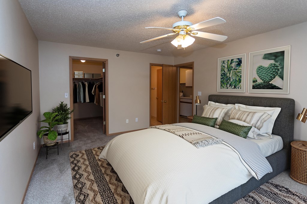 Bedroom with Bed and Walk in Closet