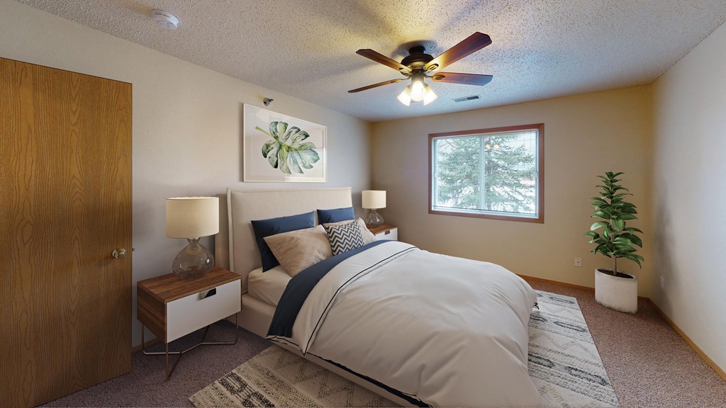 Bedroom with Bed, Dresser and Ceiling Fan