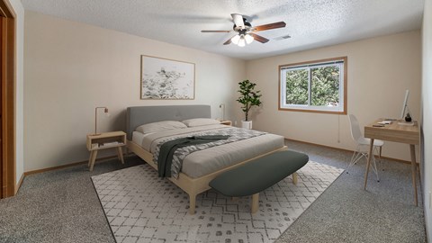 a bedroom with a bed and a ceiling fan