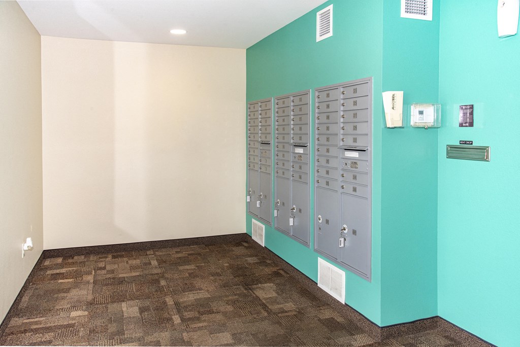 Mail Boxes against Turqoise Wall