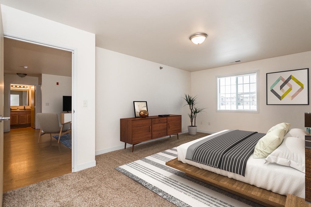 Bedroom with Bed and Dresser