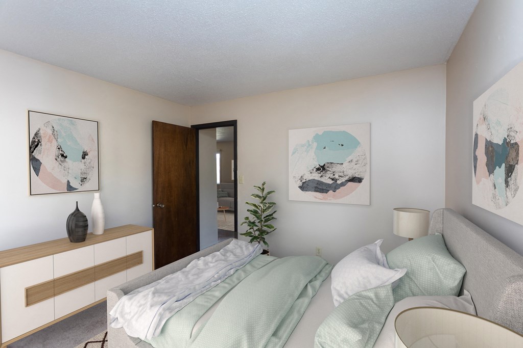 Bedroom with Bed and Dresser