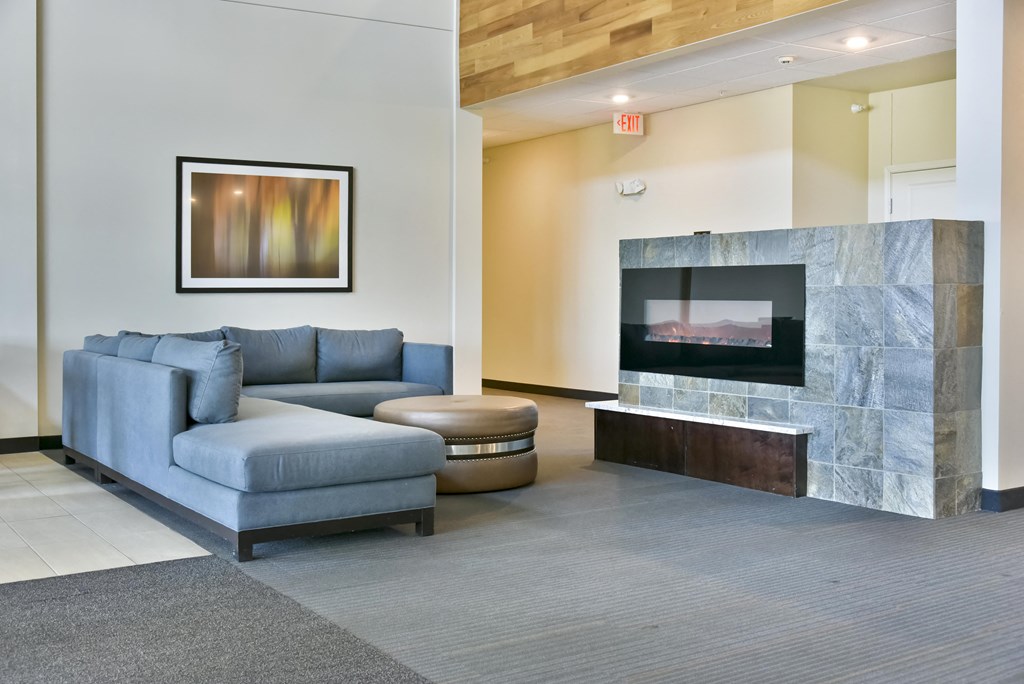 Lobby Lounge with Couch and Fireplace