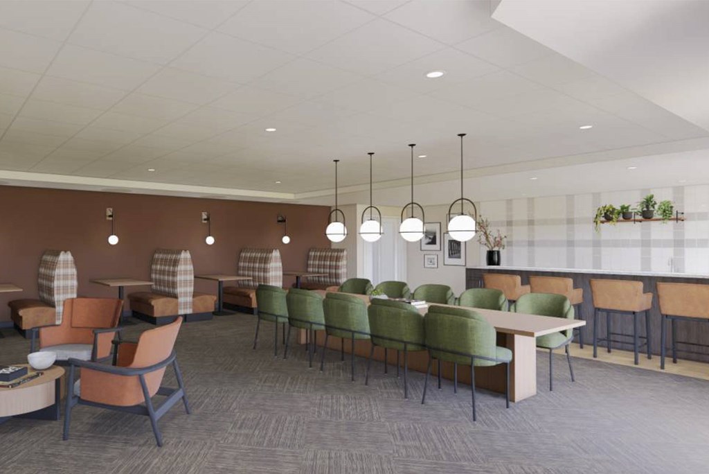 A room with a long table and chairs.