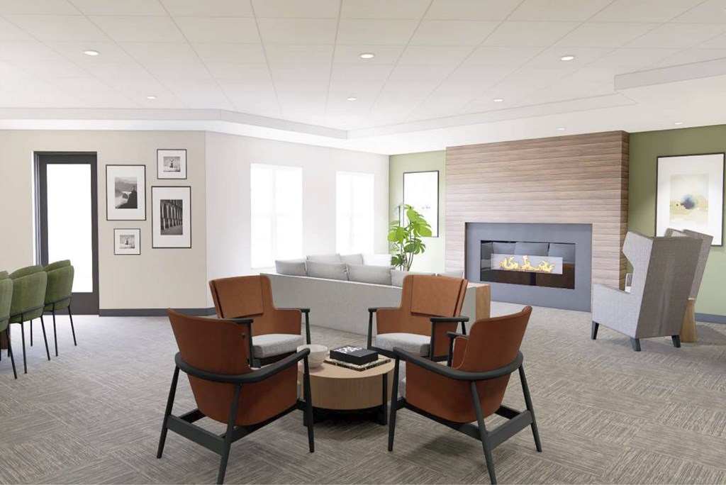 A living room with a fireplace and a couch.