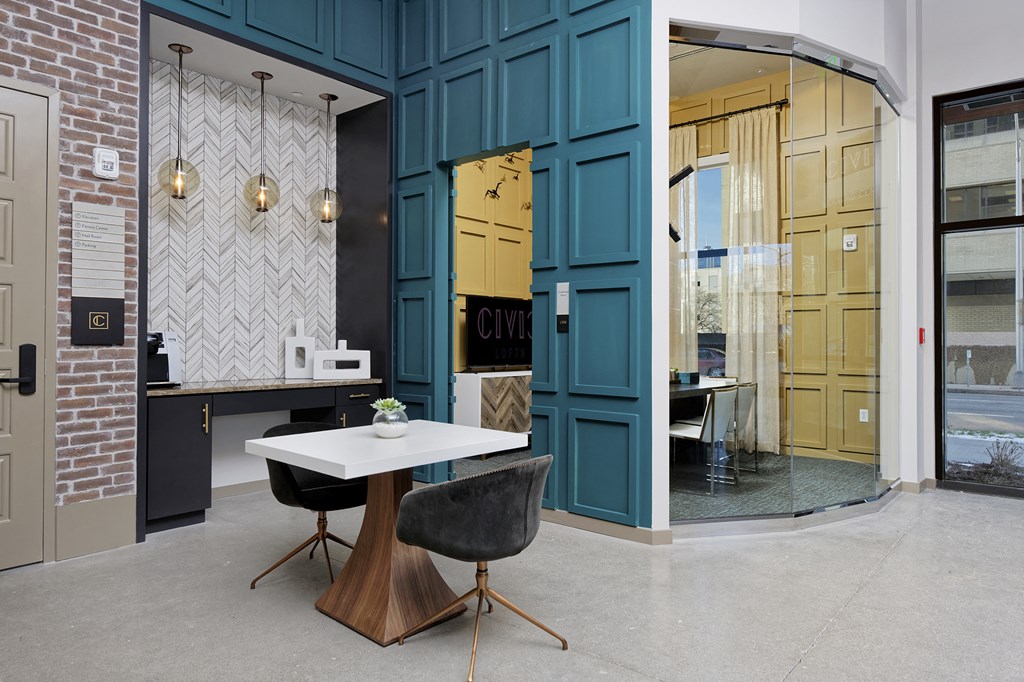 Modern business center with private meeting room, small desk and eccentric decor