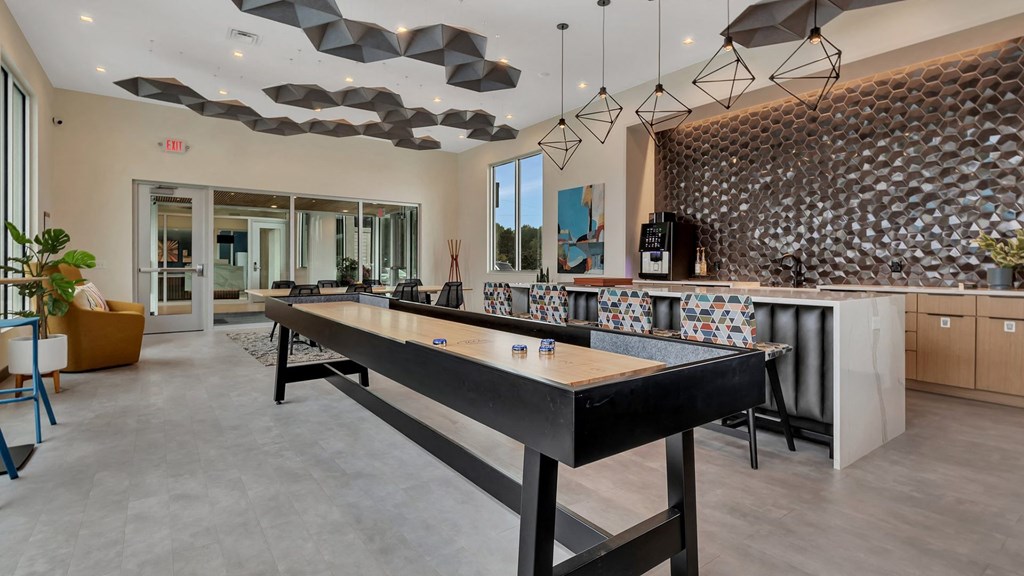 a foosball table in the clubhouse of a house