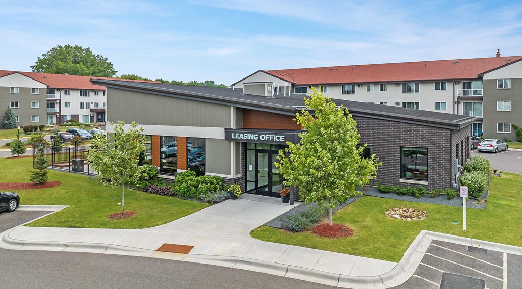 a view of the leasing office from the parking lot
